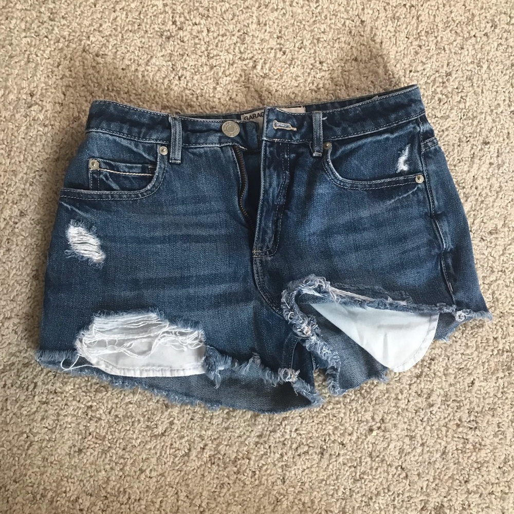 Size 01. Brand is Garage. Denim. Ripped.